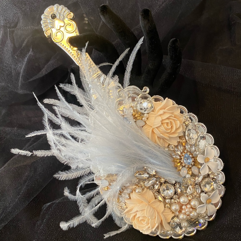 Decorated hand held mirror